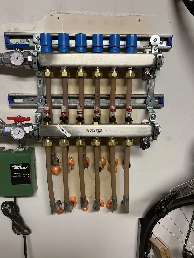 Plumber performing Leak Detection at a residential property in Billerica